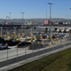 Vehicles enter a border checkpoint as they approach the Mexico border at the US Customs and Border Protection (CBP) San Ysidro Port of Entry at the US Mexico border on February 19, 2021 in San Diego, California.